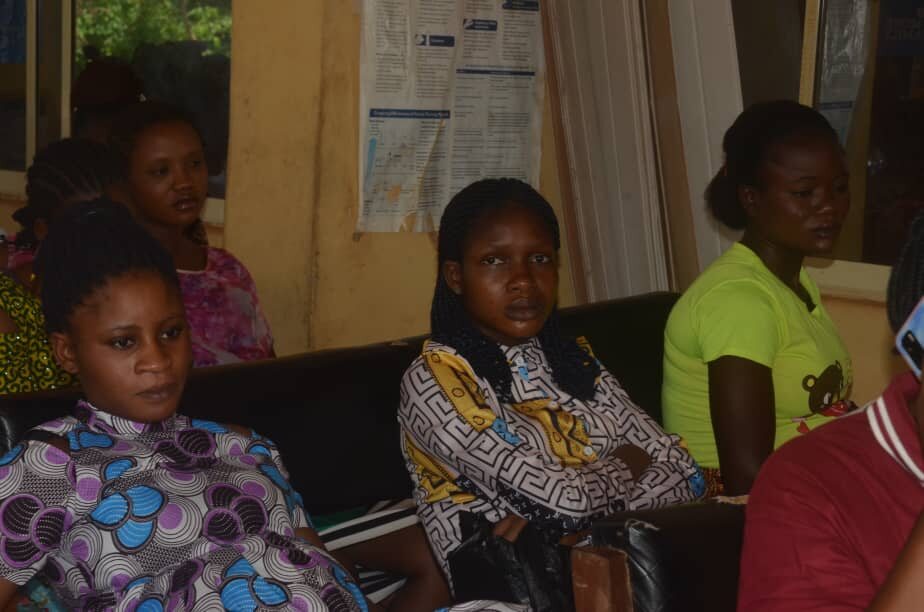 Women and Victoria’s Smile Foundation team members at a maternal health outreach in Ondo State
