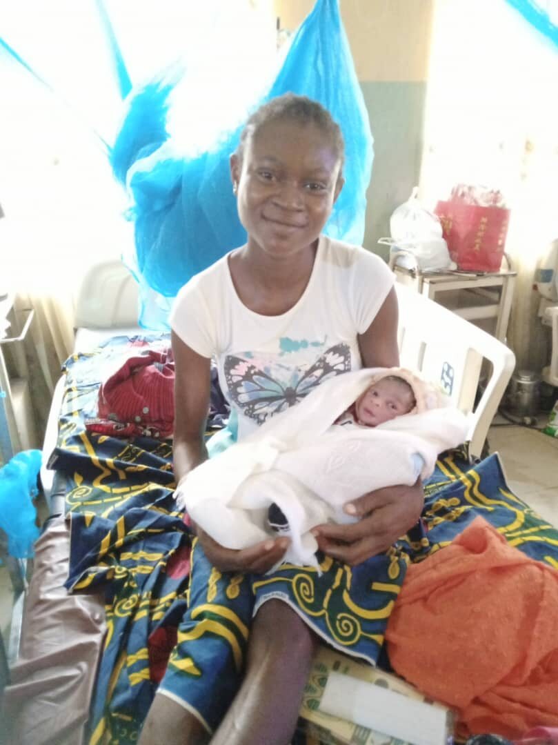 Elizabeth with her baby following support from Victoria’s Smile Foundation